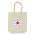 A cream tote bag with a round logo in blue and red, featuring a rope handle.