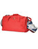 A red duffle bag with a pair of shoes partially visible, featuring a logo on the side.