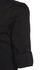 A black chef jacket featuring a rolled sleeve and a button detail, with a side pocket and a logo present.