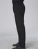 Men's functional chef pants in black, featuring an elastic waistband and cargo pockets, paired with black shoes.