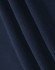 A close-up of soft, dark navy fabric, highlighting its smooth texture and folds.