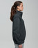 A side view of a dark grey half-zip collar polar fleece jumper with a logo.