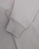 A light grey polar fleece jumper featuring a half zip collar and fitted cuffs. It has a subtle logo.