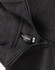 A 1/2 zip collar fleecy jumper in dark grey, featuring a hang tag and a zip closure. It has a logo.