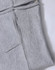 A grey fleecy hoodie featuring a full zip and ribbed cuff detail. It includes pockets and has a logo.