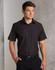 A short sleeve button-up shirt in dark brown, featuring a chest pocket and a collar, worn by a model.