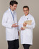 A unisex long sleeve white lab coat worn by two people, each with a notepad and clipboard.
