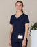 A navy short-sleeve scrub top with a contrast v-neckline and pockets, featuring a logo.