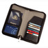 A black travel wallet with slots for a passport and multiple credit cards, featuring a smooth interior and a logo.