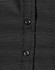 A black and white pin dot button-up shirt featuring a close-up view of buttons.