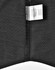 A black fabric swatch with a pin dot pattern, featuring a label with material information and a logo.