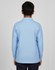 A back view of a light blue long-sleeved polo shirt with a collar, featuring a logo.