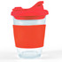 A reusable coffee cup with a clear body and a vibrant red snap lid, featuring a matching silicone sleeve for grip.
