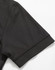 A black polo shirt featuring a smooth fabric texture and neatly finished sleeve hem. It also has a logo.