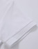 A white polo shirt featuring a textured fabric and a folded sleeve detail. It includes a logo.