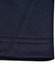 A close-up of the hem of a navy polo shirt showcasing the fabric texture and stitching detail.