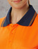 A close-up of a unisex orange polo shirt with a navy blue collar and three buttons, featuring a logo.