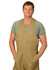 Men's cotton drill action back overall in beige, featuring pockets and worn over a green shirt. Model is smiling.