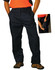 Men's cotton drill cargo pants in navy, featuring knee pads, side pockets, and a logo.
