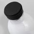 A drink bottle with a glossy white body and a black screw-on lid, featuring a logo on the side.
