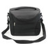 A black cooler bag with a shoulder strap and zippered compartments, featuring a mesh side pocket and a top handle.