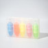 A set of five highlighters in blue, pink, yellow, orange, and green, housed in a transparent case with a logo.