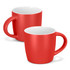 A drinkware set featuring two red mocha coffee mugs with contrasting white interiors and a curved handle.