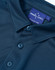 A navy blue men's sustainable jacquard knit short sleeve polo with a branded label and button details.