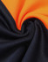 A close-up view of fabric featuring bright orange and black colours, showcasing a smooth texture and weave.