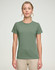 A green ladies' premium cotton short-sleeve tee shirt displayed on a model, featuring a simple design and a logo.