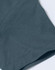 A close-up of a grey premium cotton short sleeve tee shirt, featuring a smooth fabric texture and a stitched hem.
