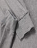 A grey long-sleeve tee shirt with a soft fabric and cuffed sleeves, featuring a logo on the side.