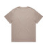 A light beige T-shirt with a relaxed fit, featuring a simple design and a subtle logo.