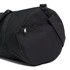 A black duffel bag featuring a zipped pocket and an adjustable strap. The bag has a simple design and branding.