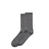 Two pairs of grey socks with a subtle texture, packaged together. Includes a branding logo.