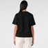 A black short-sleeved tee with a simple design, featuring a back view of the garment.