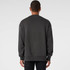 A grey jumper with long sleeves and a relaxed fit, featuring a logo on the back.