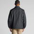 A black coach jacket with a relaxed fit, featuring long sleeves and a collar. The back view shows a clean design.