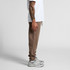 Brown track pants with a relaxed fit and an elastic waistband, paired with grey sneakers, showcased from the side.