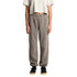 Faded track pants in grey, featuring a relaxed fit with elastic cuffs and waistband, modelled by a person.