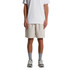Relax Track Shorts in light beige, featuring an elastic waistband and a logo, paired with a plain white t-shirt.