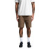 Cotton cargo shorts in a light brown colour, featuring multiple pockets, worn by a person with tattoos.