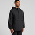 A black tech windbreaker jacket featuring a hood and a front pocket, worn by a man standing against a plain background.