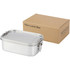 A stainless steel lunch box with a clear lid beside a rectangular cardboard box, featuring branding.