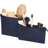A navy toiletry bag set containing a hairbrush, toiletries, and bamboo toothbrushes, with two zipped compartments.