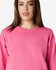 A pink Gildan Softstyle adult sweatshirt featuring a crew neck and long sleeves, with a logo on the front.