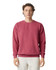 A crewneck sweatshirt in a deep pink colour, featuring a relaxed fit and long sleeves. It has a logo on it.