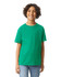 A green short sleeve t-shirt for youth displayed on a smiling child. The t-shirt has a logo on it.