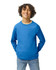 A blue Gildan Heavy Cotton youth long sleeve T-shirt worn by a smiling child, with hands in pockets.