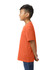 A youth midweight T-shirt in vibrant orange, viewed from the back, worn by a child. The shirt has a logo.